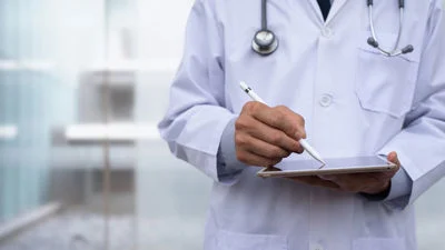 Doctor holding a clipboard